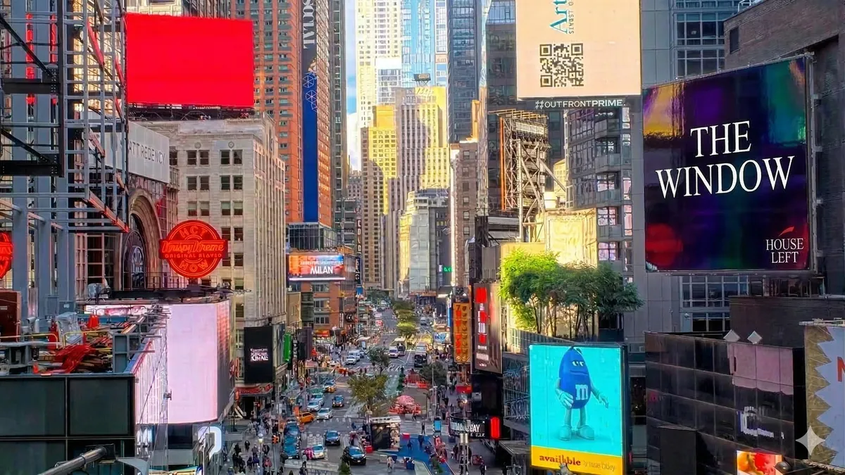 Mock-up of a billboard reading The Window, with the House Left logo, above a sunlit Times Square avenue full of ads.